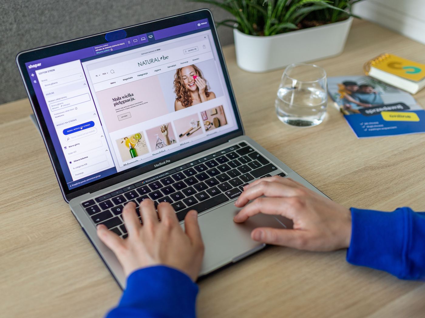 A hosted store builder being edited on a laptop